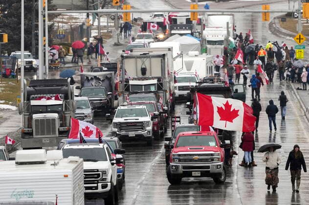 February 11, 2022, Windsor, Canada: Truckers and supporters block the access leading from the Ambassador Bridge, linking Detroit and Windsor, as truckers and their supporters continue to protest against COVID-19 vaccine mandates and restrictions, in Windsor, Ont., Friday, Feb. 11, 2022. WINDSOR CANADA - ZUMAc35_ 20220211_zaf_c35_146 Copyright: xNathanxDenettex