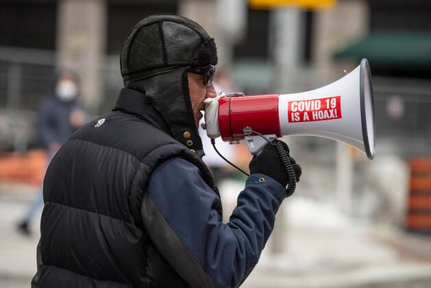 February 12, 2022, Toronto, Ontario, Canada: Protesters gather on the streets on Toronto for a second week in opposition of COVID-19 measures and vaccine mandates imposed by the Justin Trudeau government. Organized by the Ã¢â‚¬oeFreedom ConvoyÃ¢â‚¬Â, the demonstration began with a cross-country trek opposing the federal governmentÃ¢â‚¬â ¢s vaccine mandate for cross-border truckers. Toronto Canada - ZUMAc232 20220212_zip_c232_009 Copyright: xGilesxCampbellx