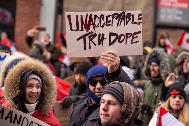 February 12, 2022, Toronto, Ontario, Canada: Protesters gather on the streets on Toronto for a second week in opposition of COVID-19 measures and vaccine mandates imposed by the Justin Trudeau government. Organized by the Ã¢â‚¬oeFreedom ConvoyÃ¢â‚¬Â, the demonstration began with a cross-country trek opposing the federal governmentÃ¢â‚¬â ¢s vaccine mandate for cross-border truckers. Toronto Canada - ZUMAc232 20220212_zip_c232_015 Copyright: xGilesxCampbellx