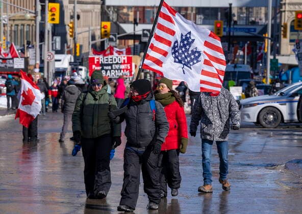 February 13, 2022, Ottawa, on, Canada: People walk during an anti-mandate protest on Parliament Hill in Ottawa on Sunday, February 13, 2022. Ottawa Canada  - ZUMAc35_ 20220213_zaf_c35_092 Copyright: xFrankxGunnx