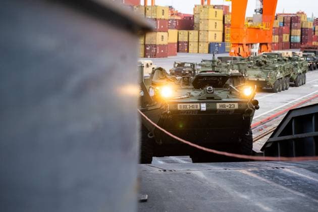 February 13, 2022, Gdynia, Pomerania, Poland: US Army Stryker seen moving towards the ARC Defender vessel at the Baltic Container Terminal in Gdynia..The US Army transports military equipment from Poland to the United States after being deployed for 9 months, Is the long-term rotation of the equipment. Another unit arrives to train together with the troops of Great Britain, Croatia and Romania as part of joint military maneuvers in Poland and Europe. Gdynia Poland - ZUMAs197 20220213_zaa_s197_124 Copyright: xMateuszxSlodkowskix