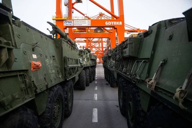 February 13, 2022, Gdynia, Pomerania, Poland: US Army Stryker s seen in a queue to the ARC Defender vessel at the Baltic Container Terminal in Gdynia..The US Army transports military equipment from Poland to the United States after being deployed for 9 months, Is the long-term rotation of the equipment. Another unit arrives to train together with the troops of Great Britain, Croatia and Romania as part of joint military maneuvers in Poland and Europe. Gdynia Poland - ZUMAs197 20220213_zaa_s197_130 Copyright: xMateuszxSlodkowskix