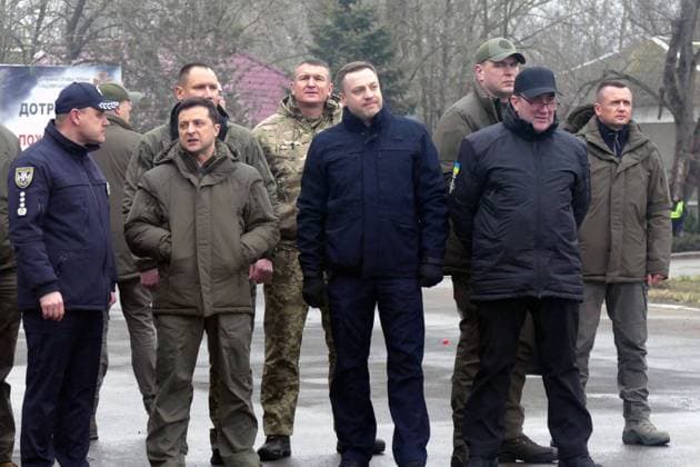 KHERSON REGION, UKRAINE - FEBRUARY 12, 2022 - President of Ukraine Volodymyr Zelenskyy (2nd L), Minister of Internal Affairs of Ukraine Denys Monastyrskyy (C) and secretary of the National Security and Defence Council (NSDC) of Ukraine Oleksiy Danilov (R) are pictured before a briefing held on the sidelines of special tactical drills organised to demonstrate the actions of Interior Ministry units and practise measures to release of administrative buildings, Kherson Region, southern Ukraine. Briefing of Volodymyr Zelenskyy in Kherson Region  Copyright: xYuliixZozuliax