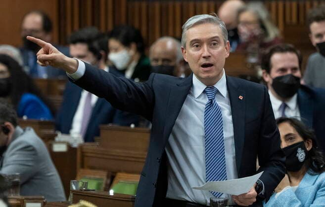 February 14, 2022, Ottawa, ON, Canada: Innovation, Science and Industry Minister Francois-Philippe Champagne rises during Question Period, Monday, February 14, 2022 in Ottawa. Ottawa Canada  - ZUMAc35_ 20220214_zaf_c35_142 Copyright: xAdrianxWyldx