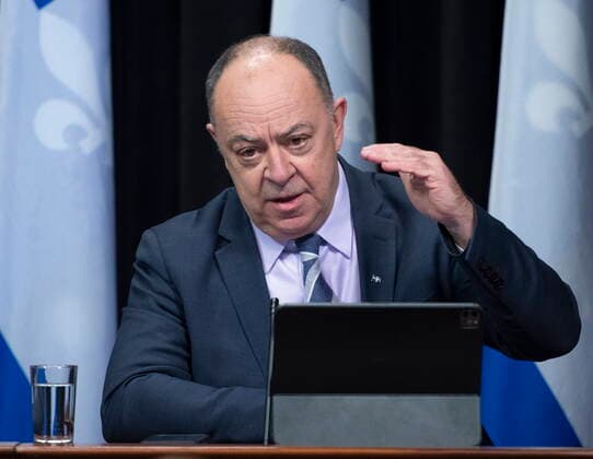 February 15, 2022, QUEBEC, PQ, Canada: Quebec Health Minister Christian Dube, right, confirms a relaxation of rules on vaccination pass, during a news conference on the COVID-19 pandemic, Tuesday, February 15, 2022 at the legislature in Quebec City. Luc Boileau, QUEBEC Canada - ZUMAc35_ 20220215_zaf_c35_146 Copyright: xJacquesxBoissinotx