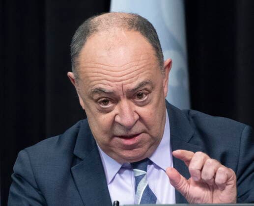 February 15, 2022, QUEBEC, PQ, Canada: Quebec Health Minister Christian Dube, right, confirms a relaxation of rules on vaccination pass, during a news conference on the COVID-19 pandemic, Tuesday, February 15, 2022 at the legislature in Quebec City. Luc Boileau, QUEBEC Canada - ZUMAc35_ 20220215_zaf_c35_147 Copyright: xJacquesxBoissinotx