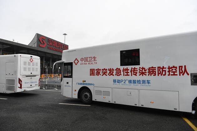 (220217) -- SHENZHEN, Feb. 17, 2022 -- Mobile COVID-19 test vehicles set out to Hong Kong for assistance in COVID-19 fight, in Shenzhen, south China s Guangdong Province, Feb. 17, 2022. China s National Health Commission (NHC) said in a statement on the website that it has been paying close attention to the fifth wave of the COVID-19 pandemic in Hong Kong. A panel of epidemiology experts were sent from Guangdong Province to Hong Kong on Thursday, along with two mobile COVID-19 test vehicles, read the statement. ) CHINA-GUANGDONG-HONG KONG-COVID-19-EPIDEMIOLOGY EXPERTS (CN) LiangxXu 