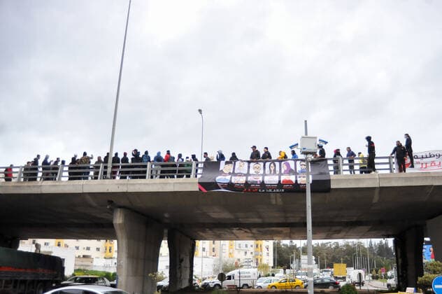 February 17, 2022, Tunis, Tunisia: Grand Tunis, Tunisia. 17 February 2022. Supporters of Football Club Africain stage a protest for the death of football fan Omar Abidi, in front of the Court of First Instance in the Tunisian city of Ben Arous. Omar Abidi, 19, drowned in a stream near the Rades Stadium in 2018, following a match between Club Africain and the Olympique Medenine teams. Abidi s family has filed a complaint against the police, with many football fans also blaming the police for he tragic death of the 19-year-old Tunis Tunisia - ZUMAd99_ 20220217_zap_d99_010 Copyright: xHasanxMradx
