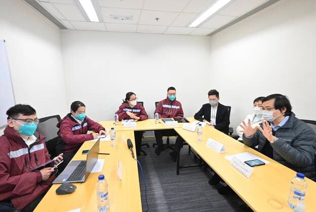 (220219) -- HONG KONG, Feb. 19, 2022 -- Epidemiologists meet and exchange experience with representatives of the Center for Health Protection of the Department of Health of the Hong Kong Special Administrative Region (HKSAR) government in south China s Hong Kong, Feb. 19, 2022. A delegation of mainland epidemiologists on Saturday continued visiting anti-COVID-19 institutions and facilities in the HKSAR, and learned about the environmental investigation carried out by the HKSAR government. ( Handout via Xinhua) CHINA-HONG KONG-MAINLAND EXPERTS-ANTI-COVID-19 (CN) InformationxServicesxDepartmentxofxthexGovernmentxofxthexHKSAR 