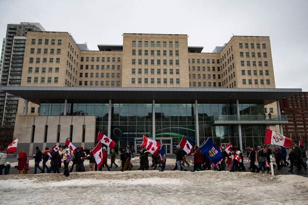 February 19, 2022, EDMONTON, AB, CANADA: Demonstrators gather to protest against COVID-19 measures and in support of a demonstration in Ottawa which has grown to a broader anti-government demonstration, in Edmonton, Saturday, Feb. 19, 2022. EDMONTON CANADA  - ZUMAc35_ 20220219_zaf_c35_129 Copyright: xJasonxFransonx