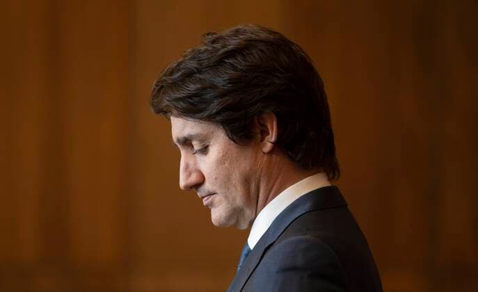 February 21, 2022, Ottawa, ON, Canada: Prime Minister Justin Trudeau listens to a question during a news conference, Monday, February 21, 2022 in Ottawa. Ottawa Canada  - ZUMAc35_ 20220221_zaf_c35_027 Copyright: xAdrianxWyldx