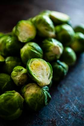 Close up of raw halved Brussels sprouts, GIOF14813