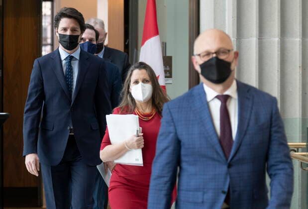 February 23, 2022, Ottawa, ON, Canada: Minister of Justice and Attorney General of Canada David Lametti, Deputy Prime Minister and Finance Minister Chrystia Freeland , Prime Minister Justin Trudeau, Public Safety Minister Marco Mendicino and President of the QueenöÄÃ s Privy Council for Canada and Emergency Preparedness Minister Bill Blair make their way to a news conference, Wednesday, February 23, 2022 in Ottawa. Ottawa Canada - ZUMAc35_ 20220223_zaf_c35_047 Copyright: xAdrianxWyldx