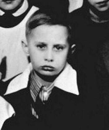 Before rising to power as one of the most infamous leaders in the world, Putin was a playful, hipster-dressing man in love. 1960, St. Petersburg, Russia: A class photo of a young VLADIMIR PUTIN, 8. St. Petersburg Russia - ZUMAz03_ 19600725_smk_z03_765 Copyright: xRussianxArchivesx