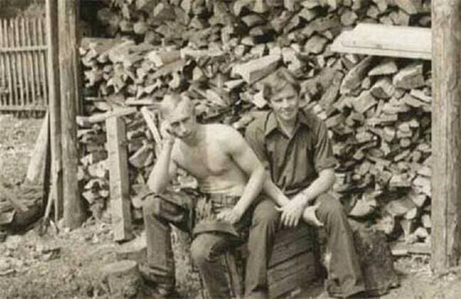 Before rising to power as one of the most infamous leaders in the world, Putin was a playful, hipster-dressing man in love. circa 1975, Russia: A young and shirtless VLADIMIR PUTIN (left). St. Petersburg Russia - ZUMAz03_ 19750601_smk_z03_754 Copyright: xRussianxArchivesx