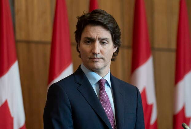 February 25, 2022, Ottawa, ON, Canada: Prime Minister Justin Trudeau listens to a speaker appearing at a news conference by video, in Ottawa, Friday, Feb. 25, 2022. Ottawa Canada  - ZUMAc35_ 20220225_zaf_c35_052 Copyright: xAdrianxWyldx