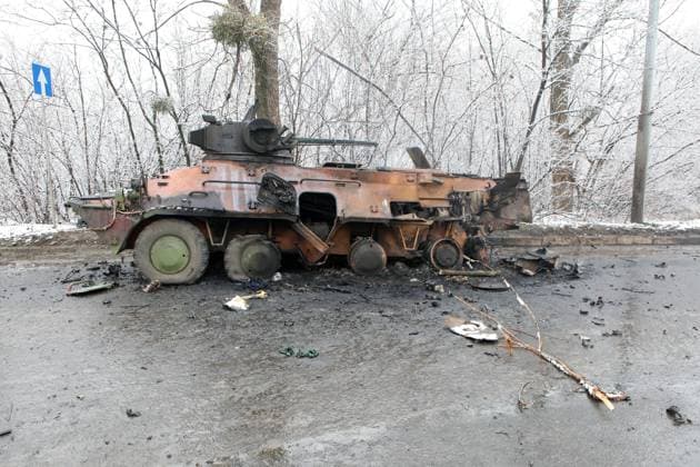 KHARKIV, UKRAINE - FEBRUARY 26, 2022 - A damaged military vehicle is pictured on the outskirt of Kharkiv, northeastern Ukraine. Consequences of hostilities in Kharkiv  Copyright: xVyacheslavxMadiyevskyyx