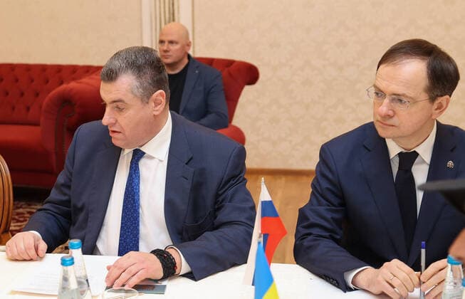 GOMEL REGION, BELARUS - FEBRUARY 28, 2022: Russian State Duma member Leonid Slutsky (L front) and Russian President Putinâ€™s adviser Vladimir Medinsky (R) at Russian-Ukrainian talks. On 27 February, an agreement was reached with the Ukrainian side about talks in the Gomel Region of Belarus in connection with the Russian military operation in Ukraine. Early on 24 February, Russia s President Putin announced his decision to launch a special military operation after considering requests from the leaders of the Donetsk People s Republic and Lugansk People s Republic. Sergei Kholodilin BELTA TASS  TS125BE2