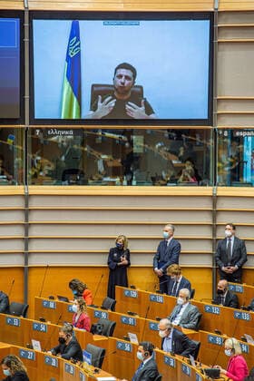 Volodymyr Oleksandrovytsj Zelensky, president of Ukraine is seen on a TV screen during a plenary session of the European parliament, in Brussels, Tuesday 01 March 2022, on the invasion of Ukraine and a vote on a motion for a resolution on Russian aggression against Ukraine.  JONASxROOSENS 15888684