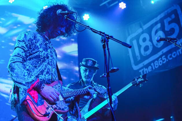 March 2, 2022, Southampton, United Kingdom: British-Iranian musician, composer, record label owner and broadcaster Kavus Torabi (L), and current lead vocalist and guitarist with Franco-British 1970s Progressive rock band Gong performing live on stage at The 1865. Southampton United Kingdom - ZUMAs197 20220302_zaa_s197_362 Copyright: xDawnxFletcher-Parkx