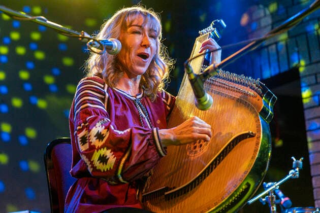 People show support for Ukraine at live music fundraiser Vera Tymshyshyn performing on the traditional Ukrainian instrument, the bandura, at the Ukrainian Refugee Fundraiser at the Brudenell Social Club, Leeds, UK Leeds Brudenell Social Club West Yorkshire United Kingdom Copyright: xIamxBurn NewsxImagesx