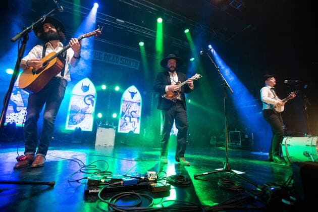 The Dead South Oslo, Norway. 07th, March 2022. The Canadian folk and bluegrass band The Dead South performs a live concert at Sentrum Scene in Oslo. Here singer and musician Nate Hilts (C) is seen live on stage with Scott Pringle (L) and Colton Crawford (R). Oslo Norway  Copyright: xGonzalesxPhoto Per-OttoxOppix