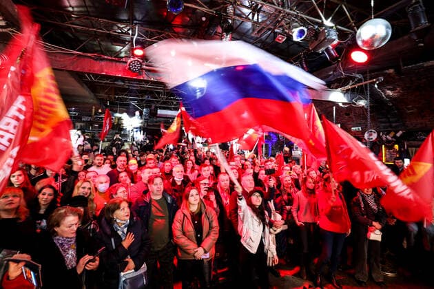 MOSCOW, RUSSIA â€“ MARCH 9, 2022: Spectators wave flags during a concert in support of the Russian Army and a special operation in Ukraine, at the Sexton club. Early on 24 February, Russia s President Putin announced his decision to launch a special military operation after considering requests from the leaders of the Donetsk People s Republic and Lugansk People s Republic. Vyacheslav Prokofyev TASS  TS1271D1