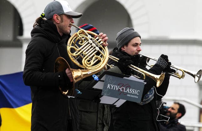 KYIV, UKRAINE - MARCH 09, 2022 - Kyiv-Classic Orchestra perform during the Free Sky concert in support of the appeal of Ukrainian people and the President of Ukraine to world leaders to close the sky over Ukraine, in Maidan Nezalezhnosti Square, Kyiv, capital of Ukraine Free Sky concert in Maidan Nezalezhnosti  Copyright: xYevhenxKotenkox
