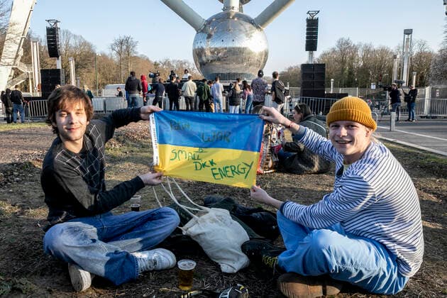 People attend the benefit festival UnitedForUkraine organized by the Brussels nightclubs, events sector and festivals, in Brussels, Thursday 10 March 2022.  HATIMxKAGHAT 20146418