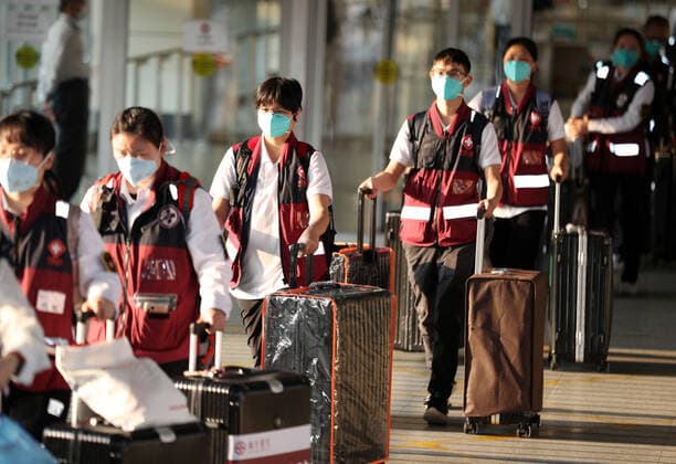 (220314) -- HONG KONG, March 14, 2022 -- The latest batch of the Chinese mainland medical staff arrive in Hong Kong, south China, March 14, 2022, to support the local fight against the COVID-19 epidemic. The team includes 36 doctors and 39 nurses from 14 public hospitals in the neighboring Guangdong Province. ) CHINA-HONG KONG-MAINLAND-MEDICAL TEAM-ARRIVAL (CN) LixGang 
