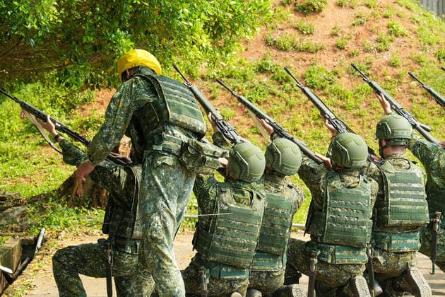 March 14, 2022, Nanshipu, Taiwan: Army reservists hold riffle during the training at a camp base in Nanshipu. Taiwan s military launched its new reservist training regimen that will provide more intensive periods of training in a bid to improve the combat readiness of reserve forces. Nanshipu Taiwan - ZUMAs197 20220314_zaa_s197_038 Copyright: xWalidxBerrazegx