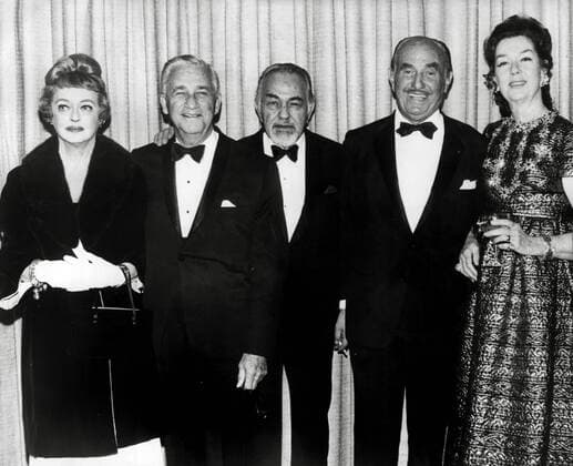 Bette Davis, Mervyn LeRoy, Edward G. Robinson, Jack L. Warner, Rosalind Russell, circa 1965. File Reference 34145-722THA  Copyright: xCinemaxLegacyxCollection ThexHollywoodxArchivex 34145-722THA
