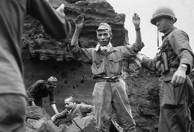 The invasion of Iwo Jima began on February 19, 1945, and continued to March 27, 1945. The battle was a major initiative of the Pacific Campaign of World War II. The Marine invasion was charged with the mission of capturing the airfields on the island, which up until that time had harried U.S. bombing missions to Tokyo. Once the bases were secured, they could then be of use in the impending invasion of the Japanese mainland.<br ><br > The battle was marked by some of the fiercest fighting of the War. The Imperial Japanese Army positions on the island were heavily fortified, with vast bunkers, hidden artillery, and 18 kilometres of tunnels.The battle was the first U.S. attack on the Japanese Home Islands and the Imperial soldiers defended th Supplier:xCPAxMediaxCo.xLtd. 1060_05_CPA0032072