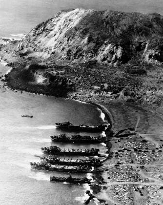 The invasion of Iwo Jima began on February 19, 1945, and continued to March 27, 1945. The battle was a major initiative of the Pacific Campaign of World War II. The Marine invasion was charged with the mission of capturing the airfields on the island, which up until that time had harried U.S. bombing missions to Tokyo. Once the bases were secured, they could then be of use in the impending invasion of the Japanese mainland.<br ><br > The battle was marked by some of the fiercest fighting of the War. The Imperial Japanese Army positions on the island were heavily fortified, with vast bunkers, hidden artillery, and 18 kilometres of tunnels.The battle was the first U.S. attack on the Japanese Home Islands and the Imperial soldiers defended th Supplier:xCPAxMediaxCo.xLtd. 1060_05_CPA0032083