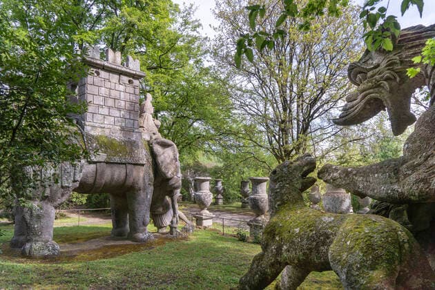 Dragon and Elephant, the Sacro Bosco, Sacred Grove colloquially called Park of the Monsters, XVI century, Parco dei Mostri in Italian, Bomarzo, Lazio, Italy, Europe MauroFlamini REDA&CO 1028_14_MFL16399