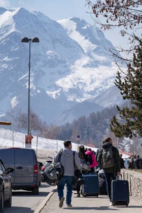 Illustration shows vacationers arrival at the second edition of the Tomorrowland Winter 2022 music festival, Saturday 19 March 2022, in Alpe D Huez, France.  OLIVIERxVIN 23213644