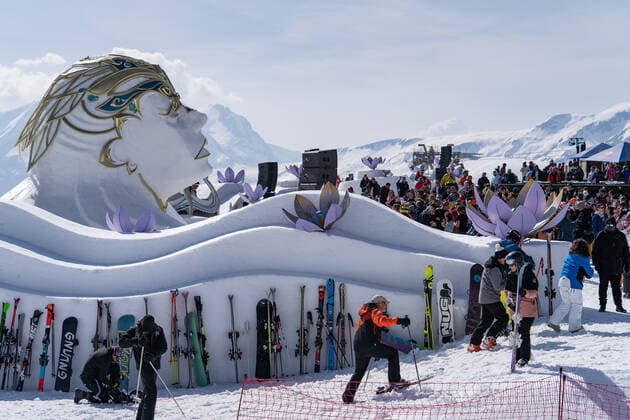 Illustration shows people enjoying the Crystal Garden stage at 2000 meters at the second edition of the Tomorrowland Winter 2022 music festival, Saturday 19 March 2022, in Alpe D Huez, France.  OLIVIERxVIN 23215650