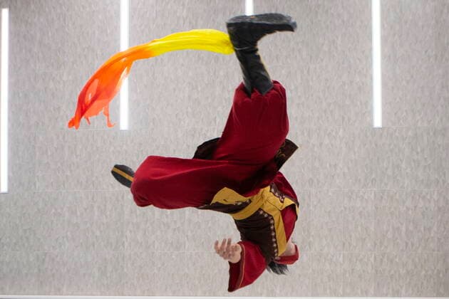 March 19, 2022, TORONTO, ON, CAN: Andrew Werner performs an acrobatic flip while costumed as Zuko from the Avatar series at Toronto Comicon, in Toronto, Saturday, March 19, 2022. The event returns for the first time since 2019 due to the COVID-19 pandemic. TORONTO CAN  - ZUMAc35_ 20220319_zaf_c35_062 Copyright: xChrisxYoungx