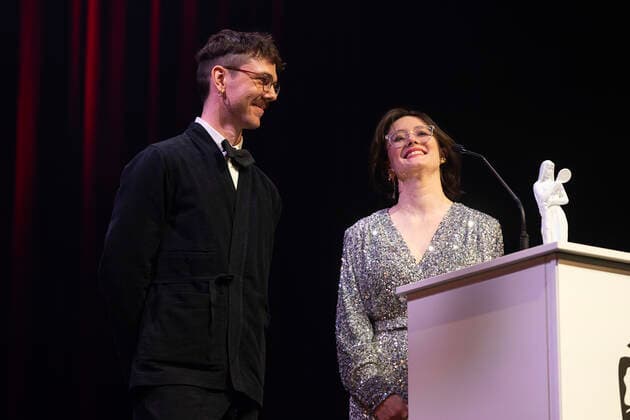 AArets Saer-Bodil gaar til Kenneth Ladekjaer og Jess Nicholls for Flugten. Bodilpriserne 2022 uddeles i Folketeatret i Koebenhavn, loerdag den 19. marts 2022.. , Copenhagen Denmark