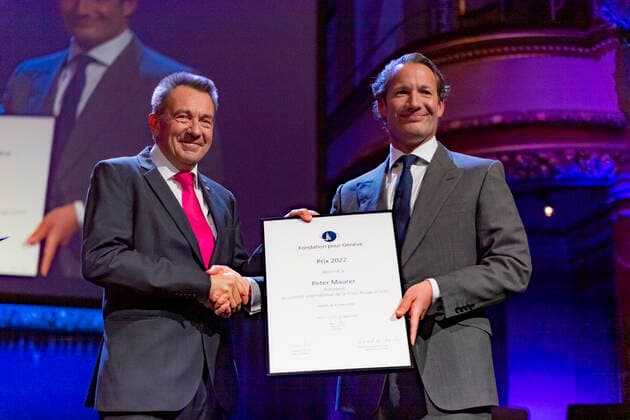 Switzerland: Foundation Award Ceremony for Geneva 2022 Peter Maurer (President of ICRC) (L) receives the Foundation Prize for Geneva for his work with the International Committee of the Red Cross, from the hand of the Marc Pictet (Director of the Pictet group) (R) during the Foundation Award Ceremony for Geneva 2022. Geneva Switzerland Switzerland Copyright: EricxDubost