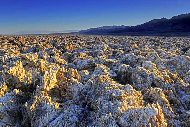 IMAGO Nature: Unsere Erde, Naturschutz, Naturschutzgebiete in Nordamerika Sonnenaufgang am Devil s Golf Course, USA, Kalifornien, Death Valley Nationalpark sunrise at Devil s Golf Course, USA, California, Death Valley National Park BLWS664462 *** Sunrise at Devil s Golf Course, USA, California, Death Valley National Park sunrise at Devil s Golf Course, USA, California, Death Valley National Park BLWS664462 Copyright: xblickwinkel McPHOTO I.xSchulzx