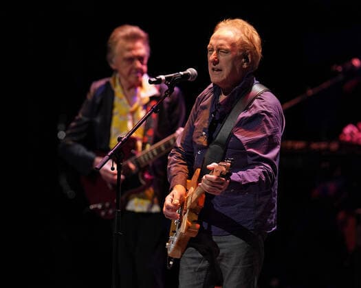 FORT LAUDERDALE FL - MARCH 23: Joey Molland and Denny Laine perform during a tribute to The Beatles Revolver and Rubber Soul albums at The Broward Center for the Performing Arts on March 23, 2022 in Fort Lauderdale, Florida. Copyright: xmpi04x