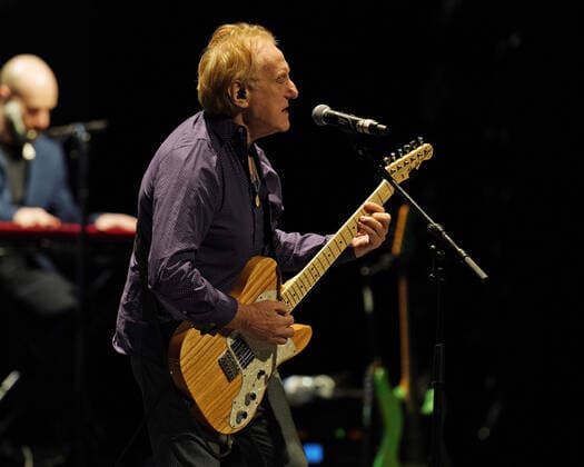 FORT LAUDERDALE FL - MARCH 23: Denny Laine performs during a tribute to The Beatles Revolver and Rubber Soul albums at The Broward Center for the Performing Arts on March 23, 2022 in Fort Lauderdale, Florida. Copyright: xmpi04x