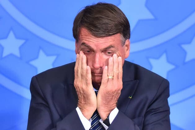 News Themen der Woche KW12 News Bilder des Tages BRASÍLIA, DF - 25.03.2022: BOLSONARO REGULARIZA TERRAS NO DF - This Friday (25) President Jair Bolsonaro (PL) participates in the Ceremony for Regularization of Land in the Federal District. In the photo, President Jair Bolsonaro grimacing. x2185178x  AntonioxMolina