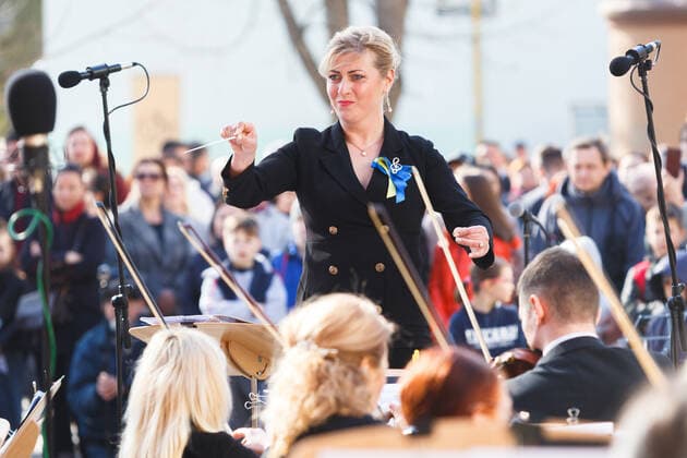 UZHHOROD, UKRAINE - MARCH 25, 2022 - A conductor Viktoria Svaliavchyk-Tsanko directs the performance of the Academic Symphony Orchestra of the Philharmonia during the concert in support of the Armed Forces of Ukraine, Uzhhorod, western Ukraine Concert in support of Ukrainian Armed Forces held in Uzhhorod  Copyright: xSerhiixHudakx