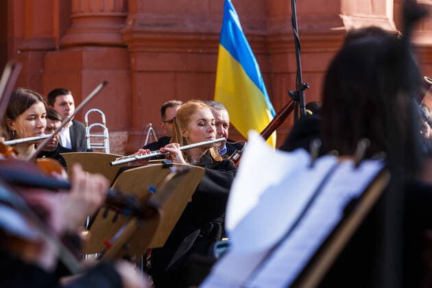 UZHHOROD, UKRAINE - MARCH 25, 2022 - A flutist of the Philharmonic Academic Symphony Orchestra performs during a concert in support of the Armed Forces of Ukraine, Uzhhorod, western Ukraine Concert in support of Ukrainian Armed Forces held in Uzhhorod  Copyright: xSerhiixHudakx
