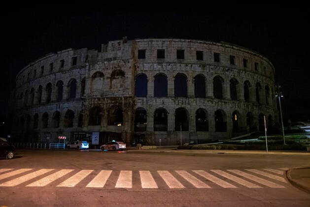 PXL_Earth hour in Pula Arena This year, the City of Pula traditionally joined the WWF (World Wide Fund For Nature) initiative, a world non-governmental organization for nature protection in the action Hour for Planet Earth by turning off public lighting around the Arena from 20.30 to 21.30 in Pula, Croatia on 26. March 2022. SreckoxNiketic PIXSELL