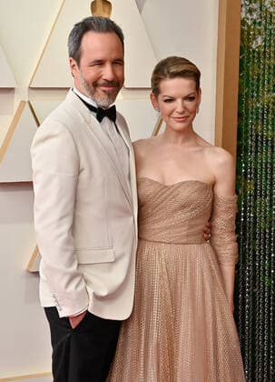 Denis Villeneuve and Tanya Lapointe arrive for the 94th annual Academy Awards at the Dolby Theatre in the Hollywood section of Los Angeles on Sunday, March 27, 2022.  LAP20220327373 JIMxRUYMEN