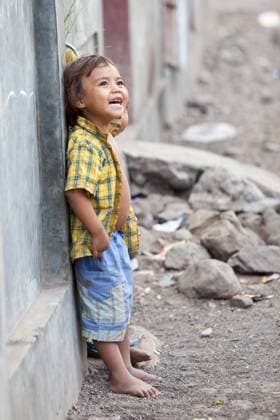 Laughing young kid in Lombok, Indonesia, model released, , property released, , 1360401.jpg, child, children, cute, laughing, happy, happiness, standing, looking, excitement, lombok, indonesia, asia, asian, village, kid, kids, young, people, person, barefoot, poverty,