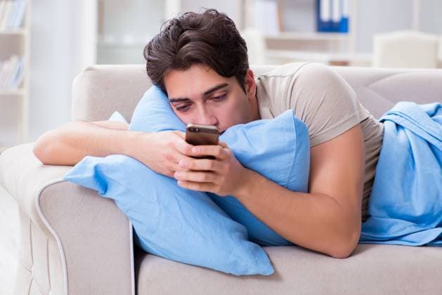 Man addicted to his mobile phone in bed, model released, , property released, , 33264566.jpg, sleep, tired, sleepy, exhausted, sleeping, insomnia, bed, bedroom, problem, sleepless, night, awake, lying, disorder, man, morning, fatigue, sick, suffering, sleeplessness, illness, asleep, nap, napping, yawning, yawn, waking, up, awaking, getting, resting, relaxing, web, online, social, network, networking, addiction, addicted, phone, telephone, smartphone, mobile, texting, text, sms, shift, home, single, couch,